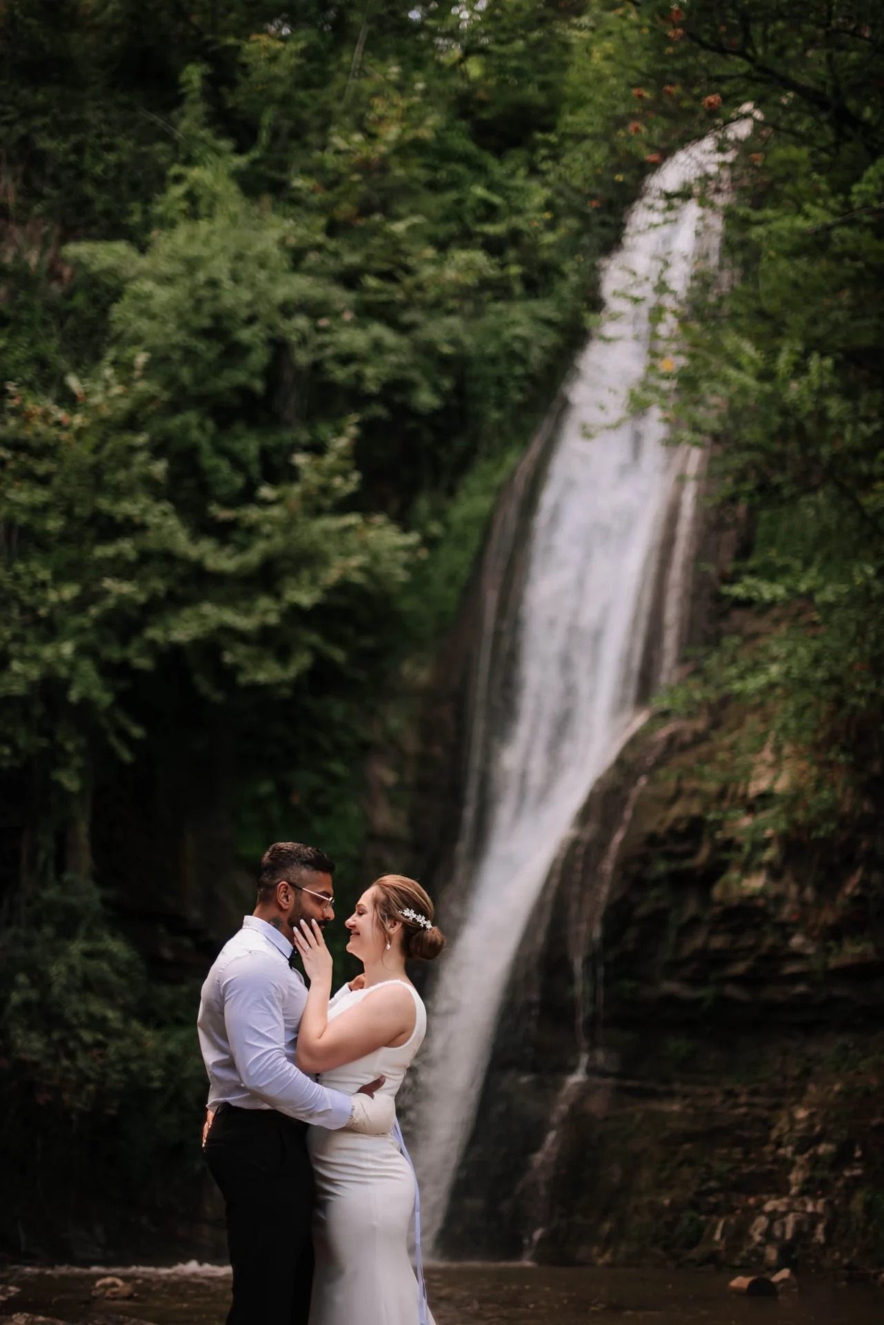 Wedding photos near a waterfall in Georgia