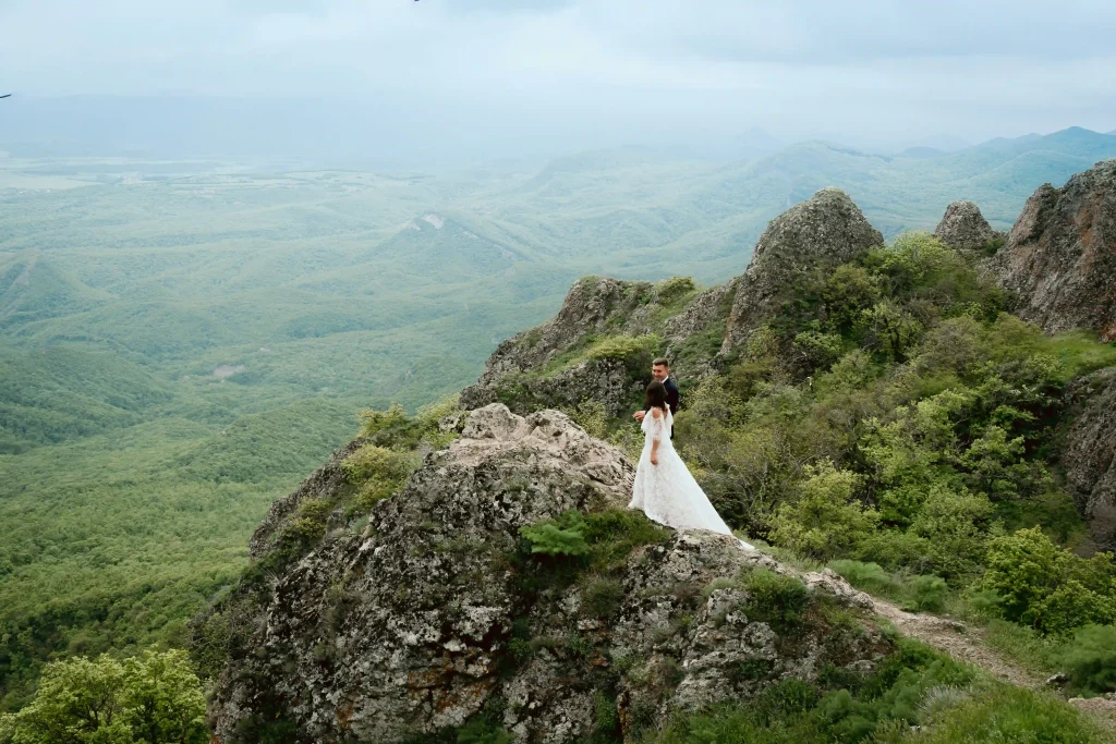 Happy newlyweds in the mountains of Georgia